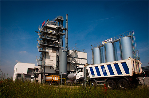 Modern automated conveyor system with sensors and control panels, showing streamlined production line operation