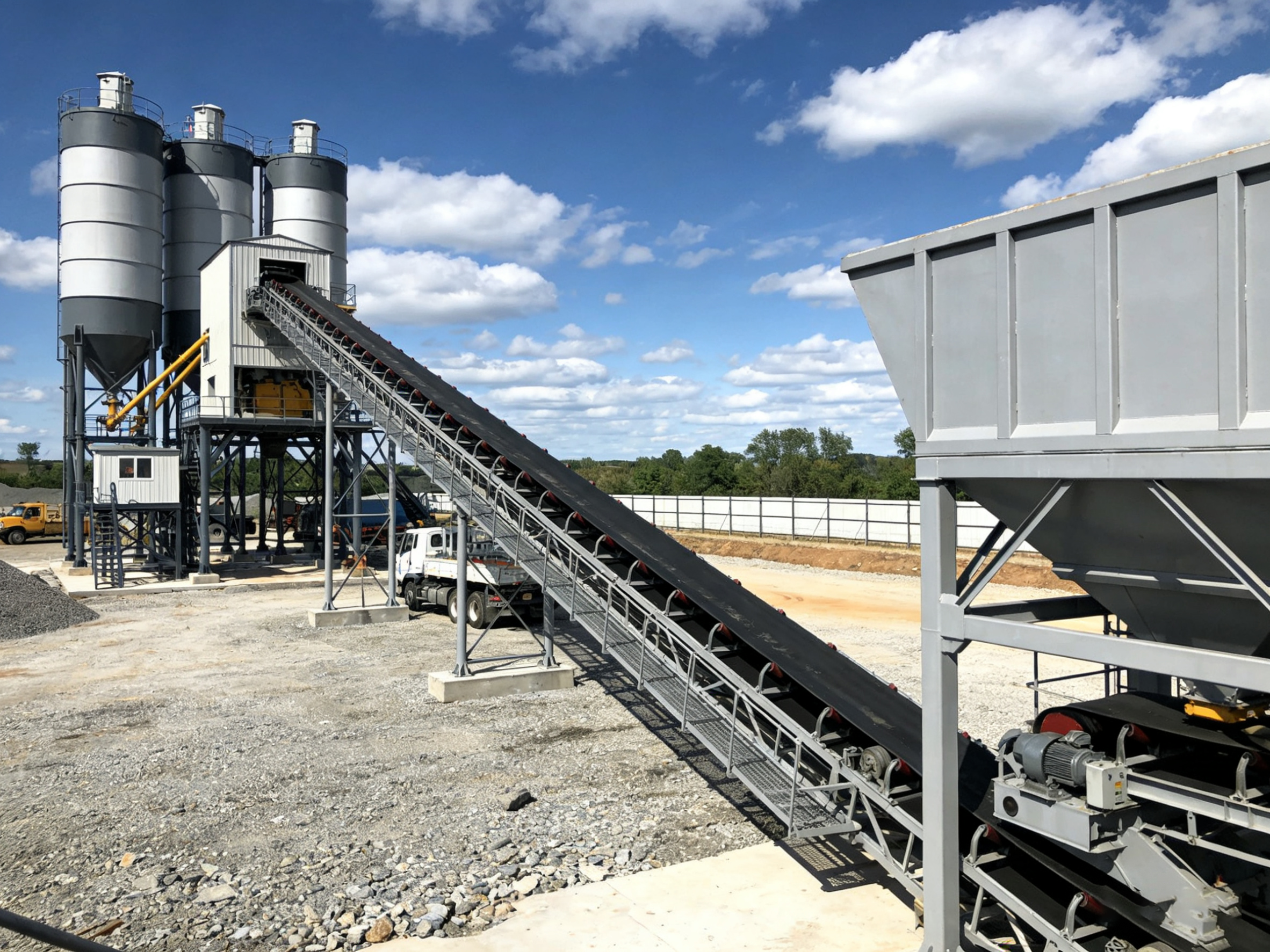 Advanced industrial robot arm with precision grippers working on automated assembly line, showing sophisticated mechanical engineering